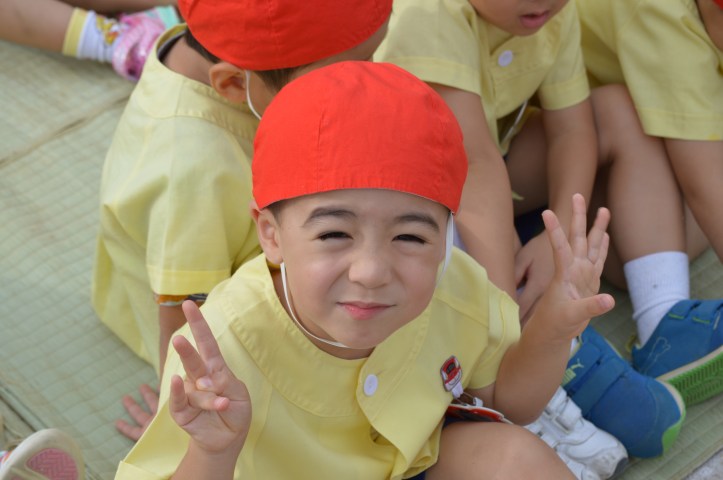 We can't figure out the hat. even my japanese family doesn't get it. It's like a swimming hat even though he isn't swimming.